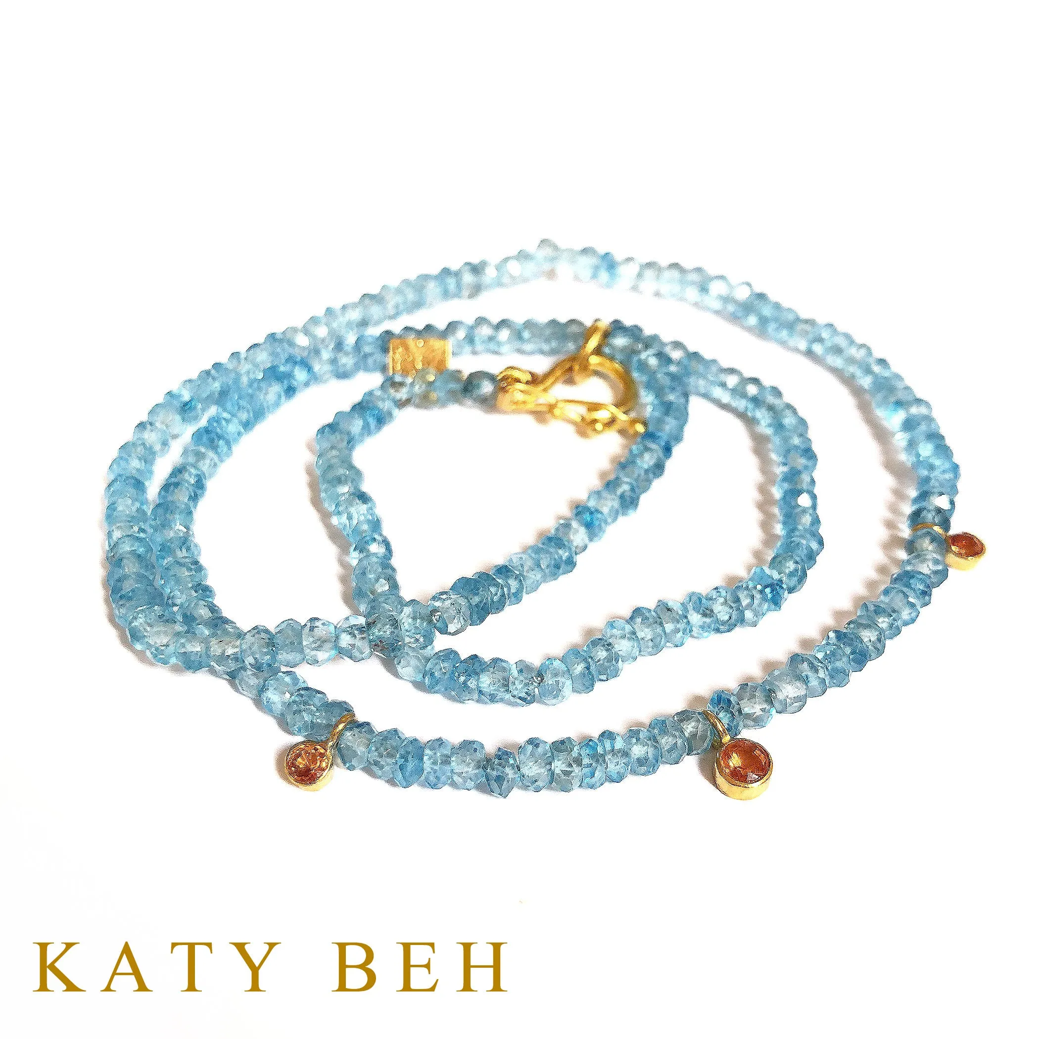 Millicent Blue Topaz and Orange Sapphire Necklace