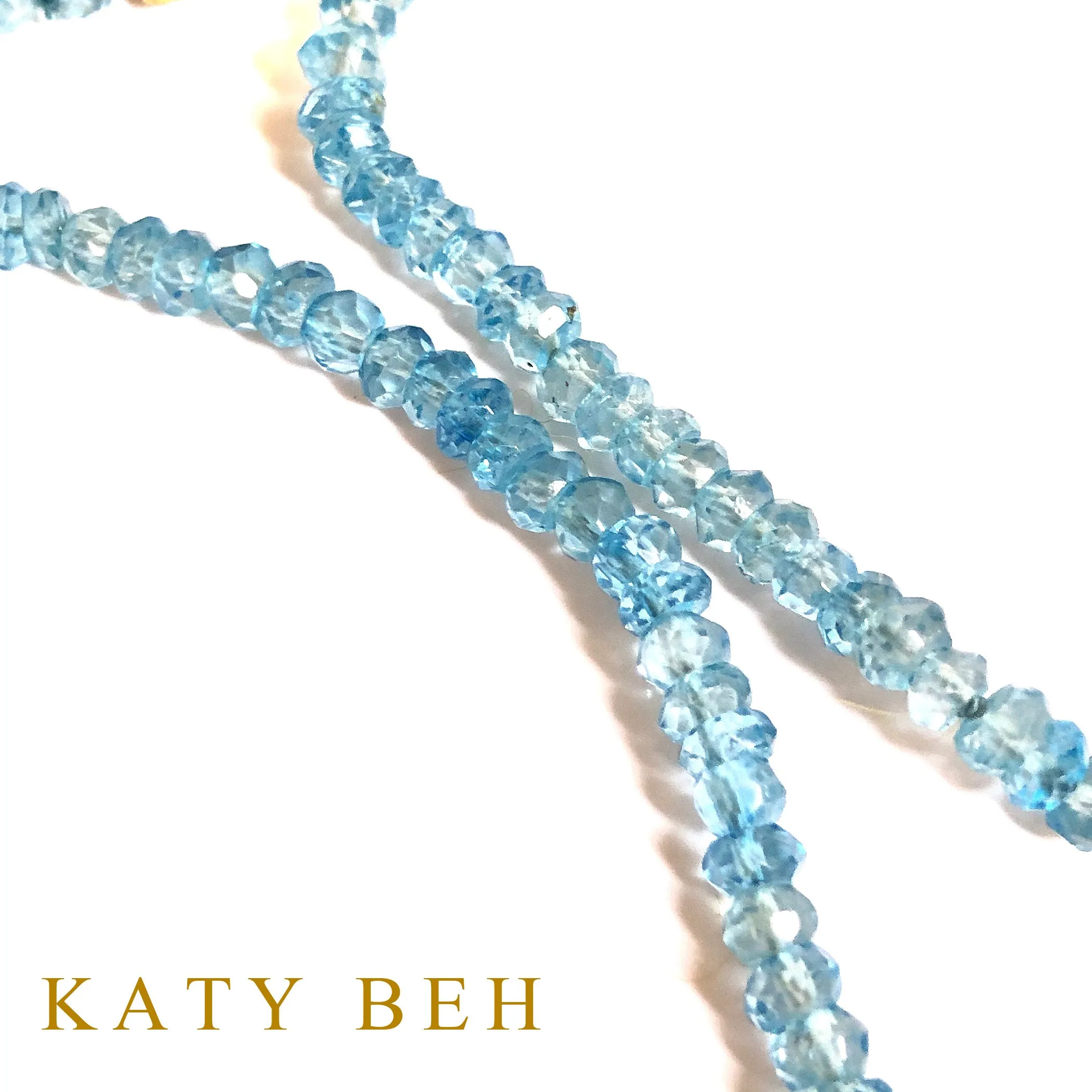 Millicent Blue Topaz and Orange Sapphire Necklace